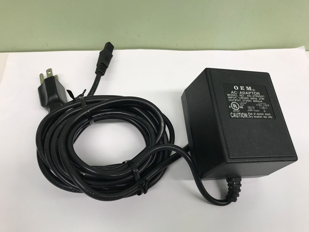 OEM AC ADAPTER MN: AD-2780GDT FOR HYPERCOM T7 SERIES TERMINALS 120VAC 60HZ 27W